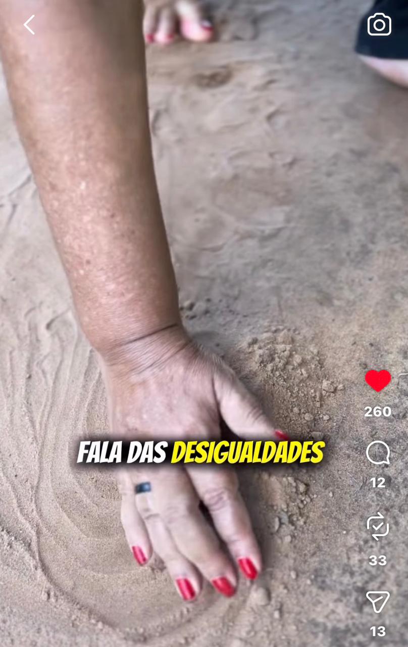 Reel: Fala das desigualdades, com mão tocando o chão seco